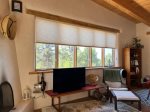 Expansive View Windows and Living Area Smart TV